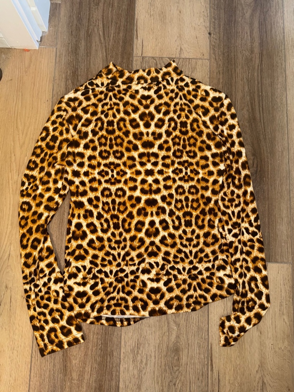Leopard print open peak a boo back size medium long sleeve